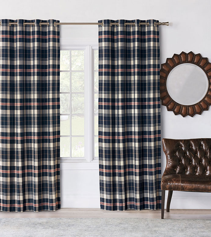 Scout Navy Drapery, Eastern Accents: Classic navy and cream plaid draperies frame a large window in a transitional living space. These tailored Bozeman draperies by Eastern Accents blend preppy charm with timeless structure—ideal for adding bold, layered window treatments in Montana homes.