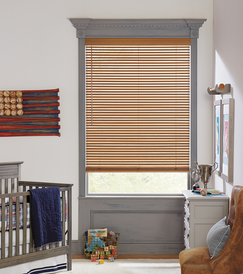 Classic Parkland wood blinds in a Bozeman nursery offer timeless style and adjustable light control for a peaceful, child-friendly space.